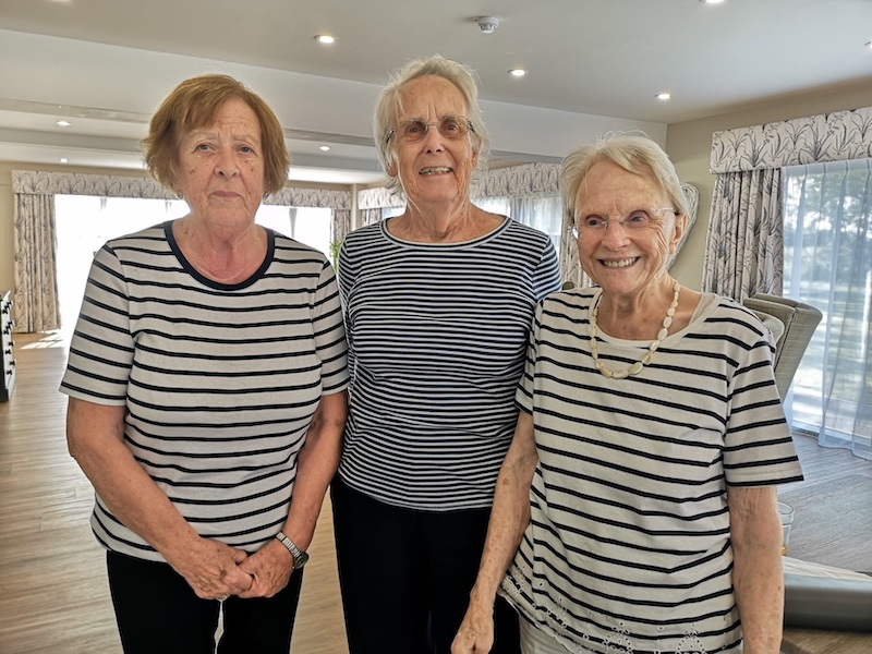 3 of our residents stood together smiling